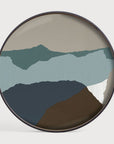 Round wall art cum serving tray with mountain landscape design on a white background