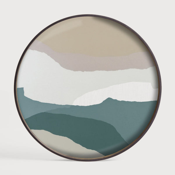 Round wall art with abstract mountain landscape design on a white background