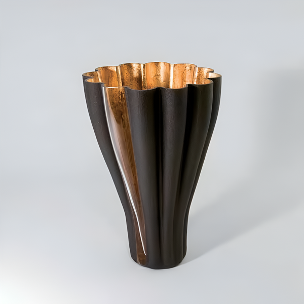 Vase with dark brown and gold design on a gray background by Evans Atelier available at Spacio retail stores in Mumbai & Kolkata. 