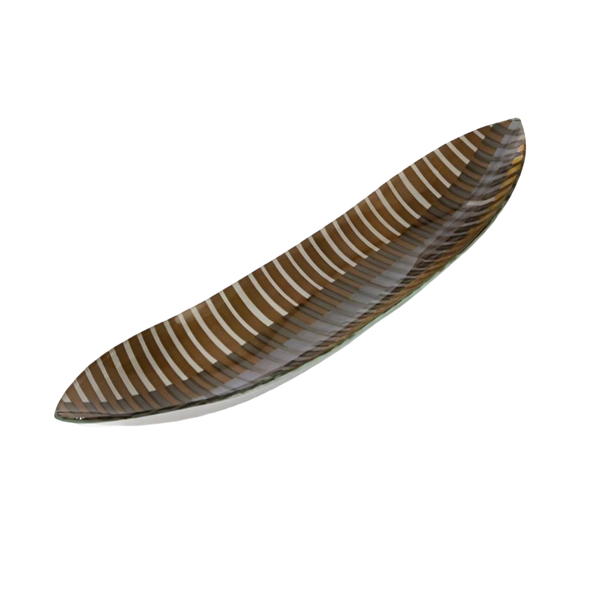 Decorative leaf-shaped plate with wavy edge on a white background by Evans Atelier available at Spacio retail stores in Mumbai & Kolkata.