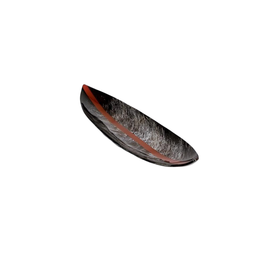 Black and red boat shape glass platter on a white background with a modern artwork and red dividing line by Evans Atelier available at Spacio retail stores in Mumbai & Kolkata. 