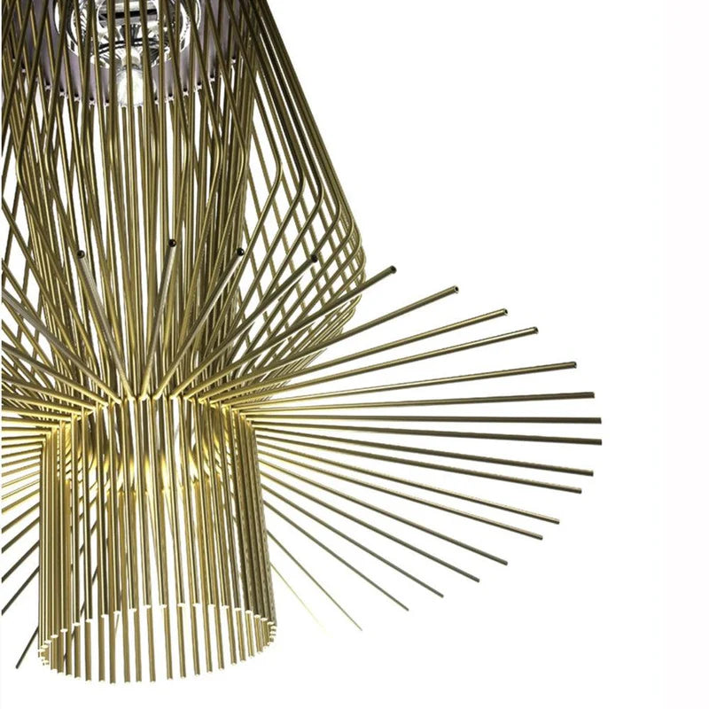 Gold pendant light fixture with a modern design on a white background