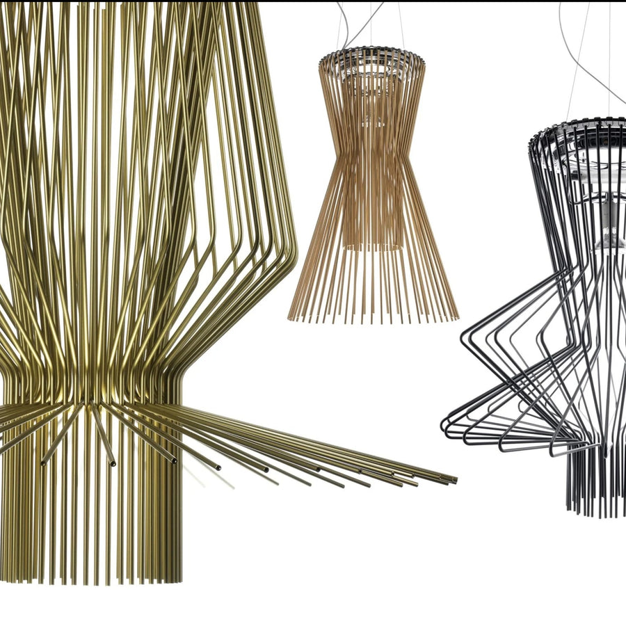 Three modern pendant lights in gold, bronze, and black on a white background