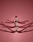Modern chandelier with a unique design on a red background