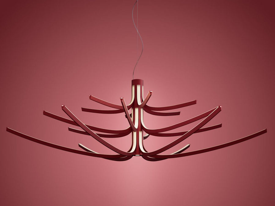Modern chandelier with a unique design on a red background