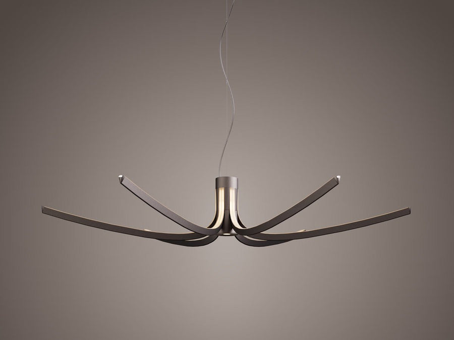 Modern chandelier with metallic finish on a gray background