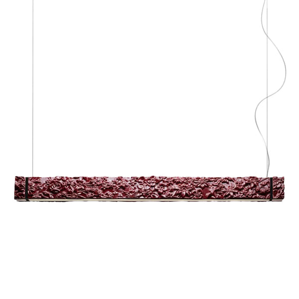 Decorative rectangular ceramic suspension lamp with intricate patterns on a white background from Foscarini available at Spacio retail stores in Mumbai & Kolkata.
