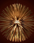 Decorative suspension light fixture with a unique design on a dark background