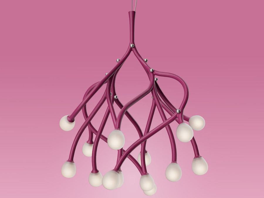 Pink chandelier with multiple light bulbs on a pink background
