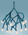 Modern teal chandelier with white bulbs on a blue background