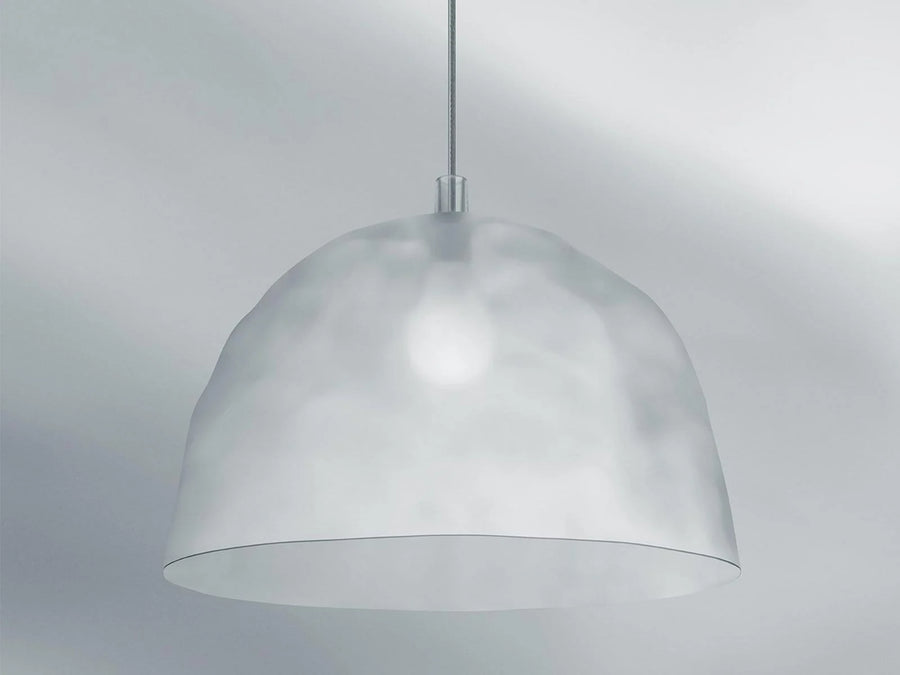 Silver pendant light against a gray background