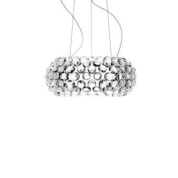 Modern pendant light with a bubble-like design on a white background from Foscarini available at Spacio retail stores in Mumbai & Kolkata. 
