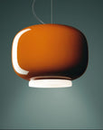 Brown pendant light on a dark gray background