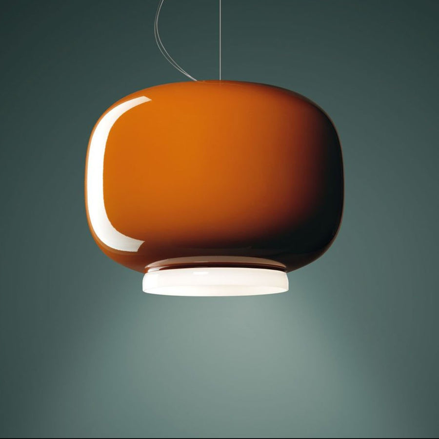 Brown pendant light on a dark gray background