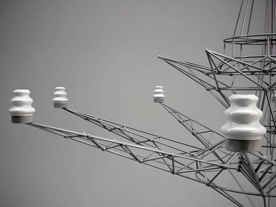 Close-up of a suspension lamp from Foscarini against a gray background