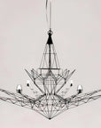Modern chandelier with geometric design on a plain background
