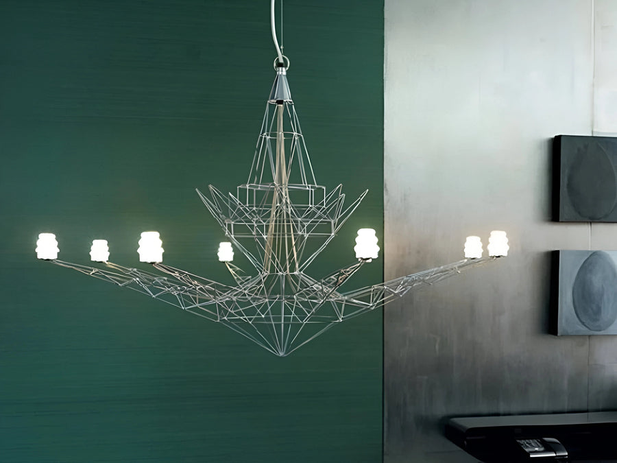 Modern chandelier with geometric design on a green wall