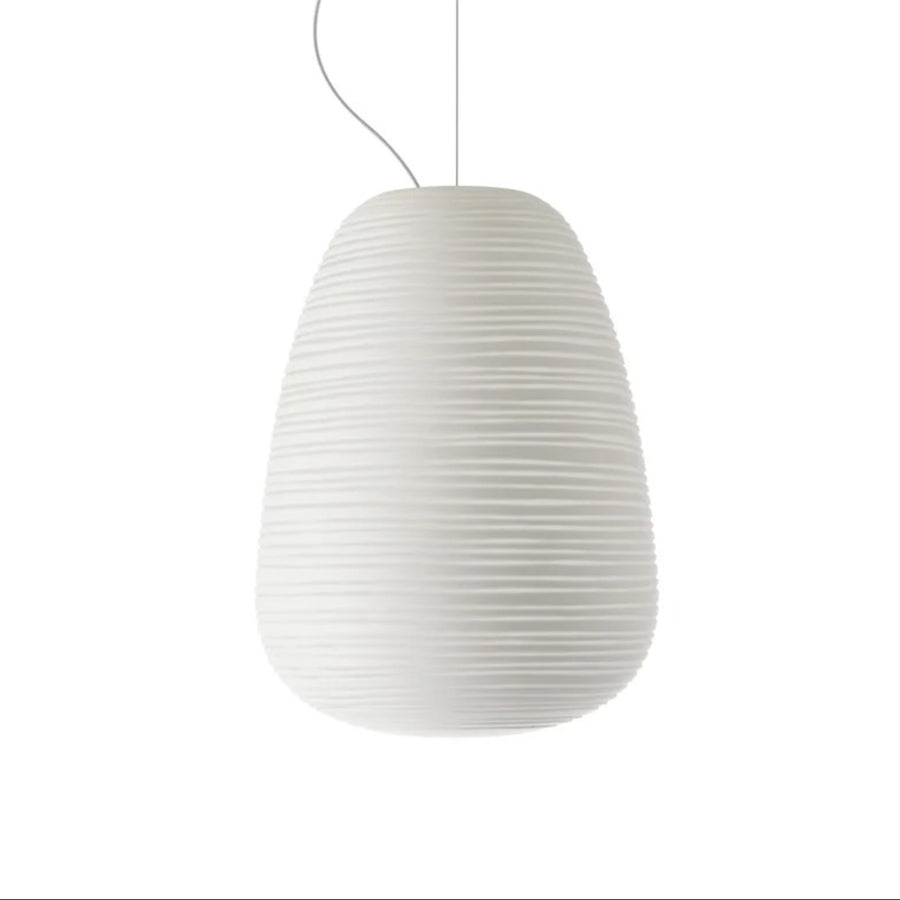 White pendant lamp with a ribbed texture on a white background from Foscarini available at Spacio retail stores in Mumbai & Kolkata. 