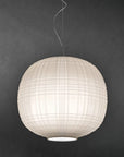White pendant lamp against a dark gray background