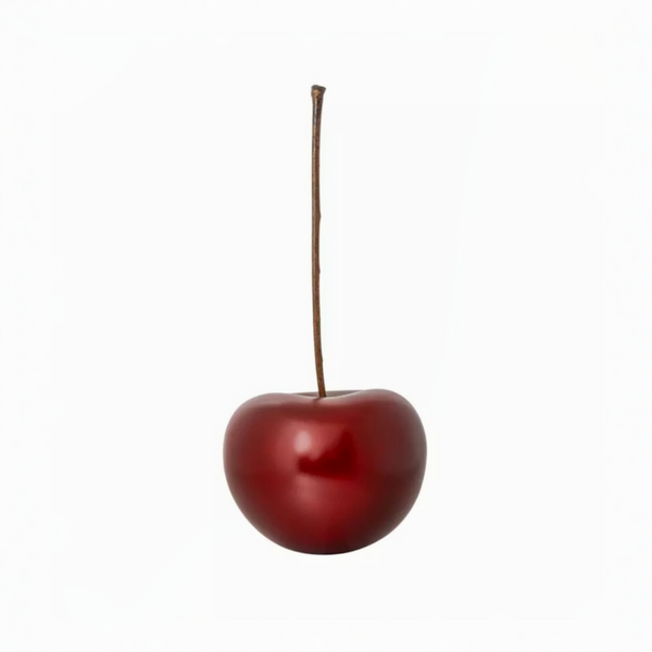 One cherries with stems on a white background