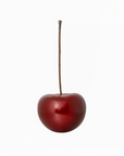 One cherries with stems on a white background