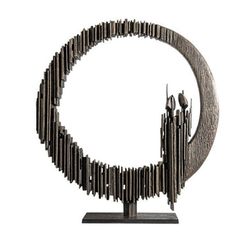 Decorative sculpture with circular design on a white background