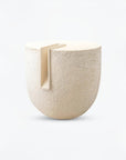 Beige ceramic sculpture Clausa Forma from Gardeco with a small rectangular opening on a white background available at Spacio retail stores in Mumbai & Kolkata