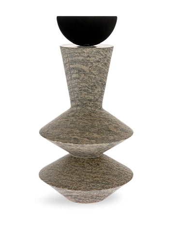 Decorative mixed media sculpture with a black metal and textured grey soap stone on a white background, from Gardeco available at Spacio retail store in Mumbai & Kolkata. 