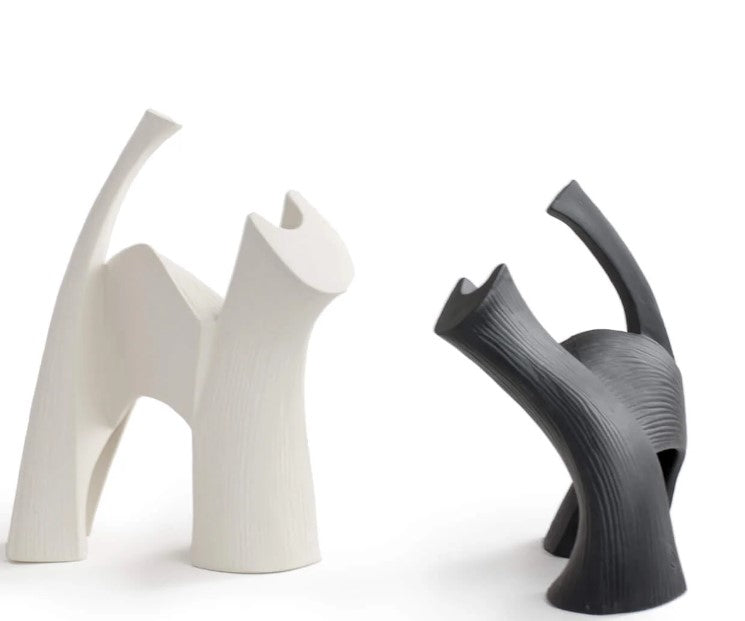 Two Gardeco Ceramic Sculpture Darius Black cat figurines on a white surface.