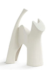 A Gardeco Ceramic Sculpture Darius White cat figurine on a white surface.