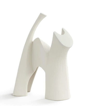 A Gardeco Ceramic Sculpture Darius White cat figurine on a white surface.