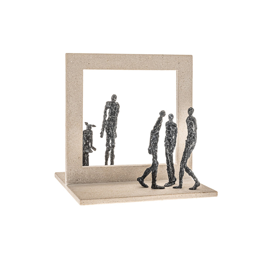 Decorative sculpture of people made in bronze and stone on a white background. 