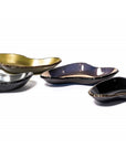 A group of Gardeco Glass Platter Bowls in different colors, created by a talented Brazilian artist.