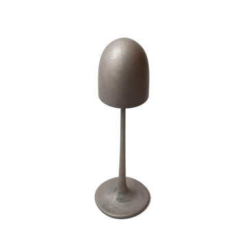 A Gardeco Bronze Sculpture Mushroom Clock with a metal base on a white background from the Mushrooms collection.