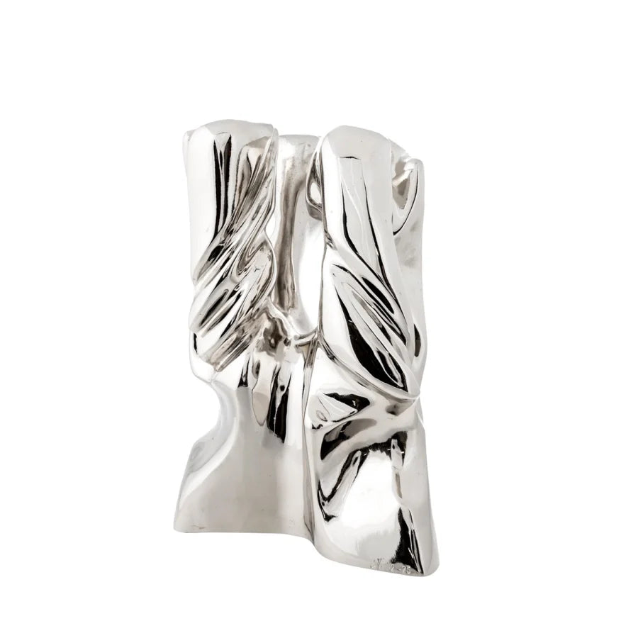Bronze sculpture in polished finish on a white background