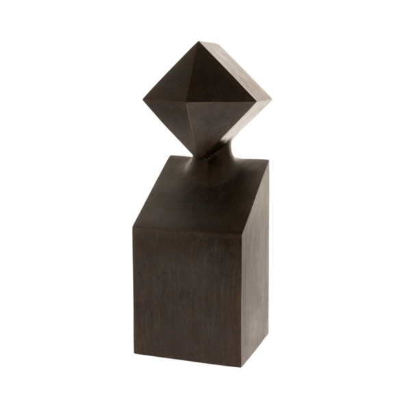 Geometric bronze sculpture with a diamond-shaped top on a white background