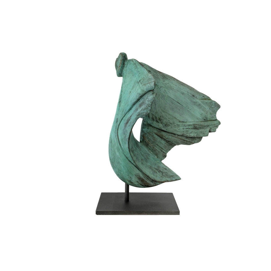Abstract green sculpture on a white background