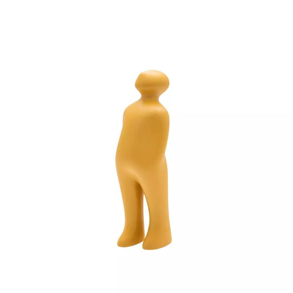 Orange abstract sculpture of a person on a white background
