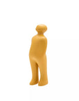 Orange abstract sculpture of a person on a white background