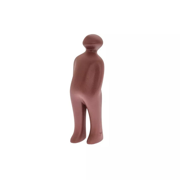 Brown ceramic figure of a person on a white background