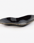 Sculptural Gardeco Ameba G platter in black top and bronze glass with gold-edged detailing – available at Spacio India for luxury table styling and centrepiece decor