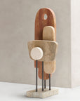 Abstract stone sculpture on a neutral background
