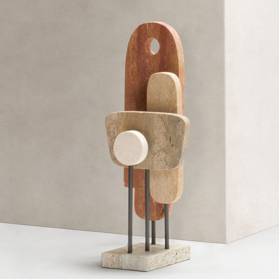 Abstract stone sculpture on a neutral background