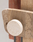 Close-up of a stone sculpture on a plain background