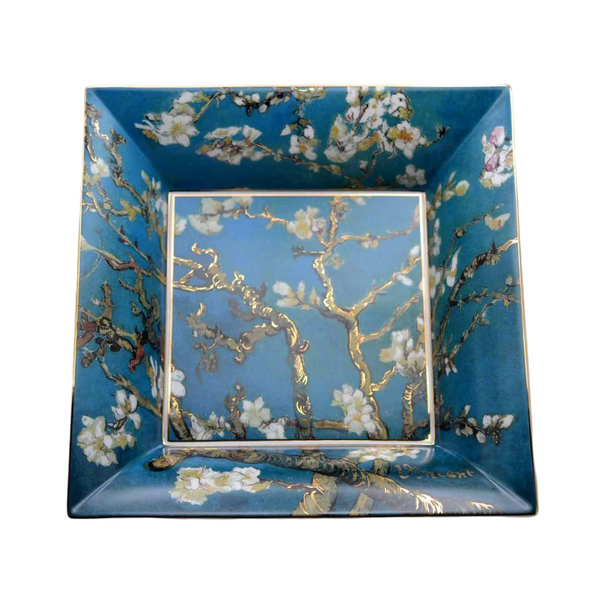 A Goebel Vincent van Gogh Almond Tree Blue Square Bowl 66879750 tray with an almond tree painting.