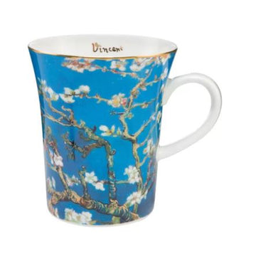 A Goebel Vincent Van Gogh Almond Tree Blue Mug 67022141 with an almond blossom on it, inspired by Vincent van Gogh's Blossoming trees.