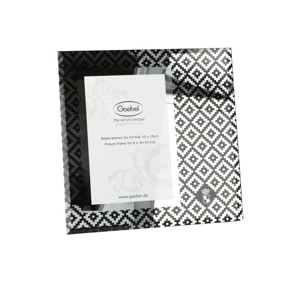 A Goebel Royal Maja Princess Diamonds Photoframe 7051221 with a black and white pattern, perfect for displaying your favorite chateau or castle memories.