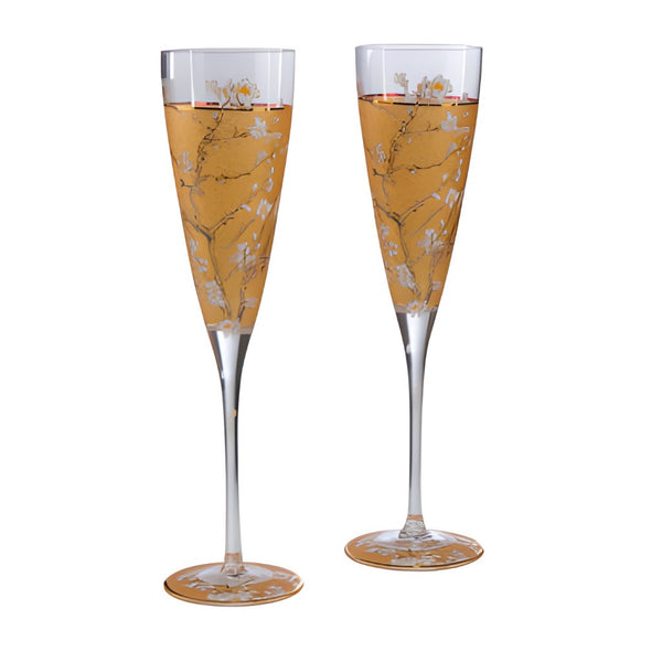 Two Goebel Vincent van Gogh Almond Tree Gold champagne glasses (Set of 2) with a Vincent van Gogh-inspired design.
