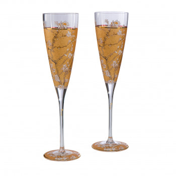 Two Goebel Vincent Van Gogh Almond Tree Gold champagne glasses (Set of 2) with a Vincent van Gogh-inspired design.