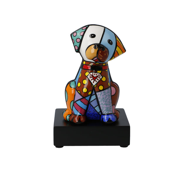 Colorful dog figurine on a black base with a white background by Romero Britto available at Spacio retail and online stores in India. 
